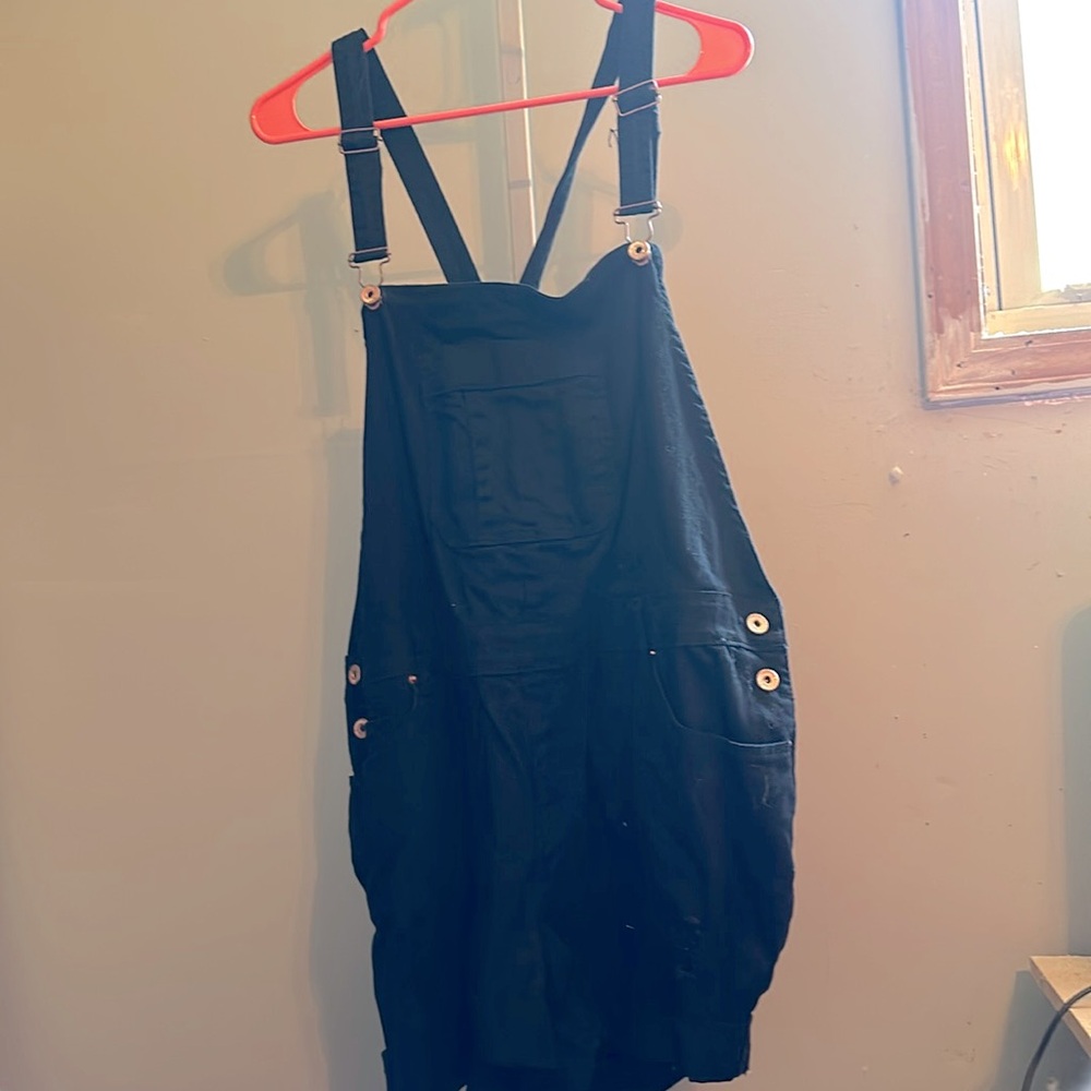 Brand new with tags. Black overall shorts.